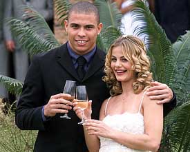 A file photograph of Brazilian soccer star Ronaldo and his wife Milene Domingues