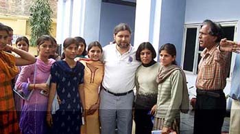 Mr Jean-Pierre Harrison, husband of Kalpana Chawla, with students of DAV College for Women, Karnal, on Friday.