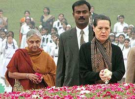 Congress president Sonia Gandhi and Delhi Chief Minister Shiela Dixit pay floral tributes at the samadhi of Pandit Jawahar Lal Nehru 