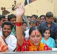 Vasundhara Raje Scindia, BJP�s chief ministerial candidate in Rajasthan, waves to her supporters after filing her nomination from Jhalrapatan constituency 