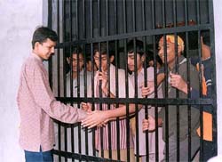 Dinesh Kumar, the Pakistani boy who was released from a juvenile jail in Faridkot, bids adieu to his jail-mates, in Faridkot 