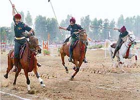 A tent-pegging team from Dehra Dun