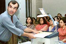 Dr Roland Case conducts a workshop at Vivek High School