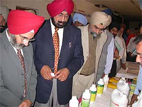 Mr Jagmohan Singh Kang, Minister for Animal Husbandry, Dairy Development, Fisheries and Sports, at an exhibition of poultry concentrates