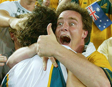Australia's Brendan Cannon is hugged by a supporter after winning the Rugby World Cup semi-final against New Zealand