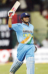 Virender Sehwag acknowledges his century
