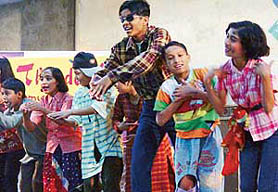 A group of children perform at St Kabir School