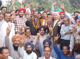 Mr Amritpal and Mr D.P. Maur, along with their supporters, are jubilant after winning the PAU Employees Union elections