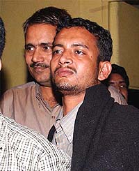 One of the three accused (right) in the poetess Madhumita Shukla murder case