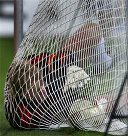 Goalkeeper Oliver Kahn of Germany lies on the ground with the ball inside the goal