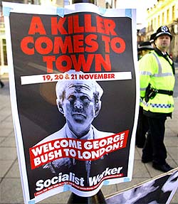 A British police officer stands guard during a demonstration against the US-led occupation of Iraq in Sheffield, northern England
