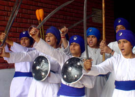 A girls� team performs �gatka� during an inter-school cultural contest organised at Ramgarhia Girls Senior Secondary School