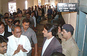 Madhya Pradesh Chief Minister Digvijay Singh arrives at the Chief Judicial Magistrate's court to file a defamation case against BJP leader Uma Bharati
