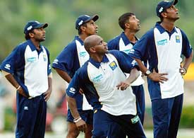 Sri Lankan cricketers train during a practice session at Dambulla, Sri Lanka