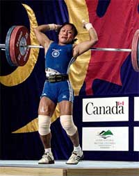Nandini Devi loses control of the weights during the women's 53-kg clean and jerk final at the World Weightlifting Championships in Vancouver