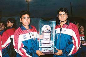 Satyawan (left) and Sunil Kumar, with the trophy they won at the first Asian Tchoukball Championship in Nasik, Maharashtra.