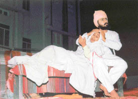 A scene from the light and sound show organised by the Pingalwara Society at Guru Nanak Khalsa College on Monday evening depicting Baghat Puran Singh taking care of his mother