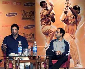 Former Pakistani speed star Wasim Akram and cricket commentator Harsha Bhogle shoot for a cricket chat show in Kolkata
