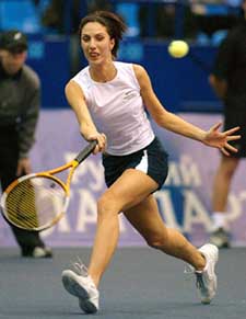 Anastasia Myskina of Russia executes a forehand return to Mary Pierce of France 