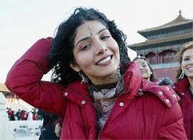 Miss World contestant Ami Vashi of India poses during a visit to the Forbidden City in Beijing 
