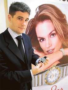 Sales Manager of Asia Omega Watches International, Jonathan Stalder, shows watches