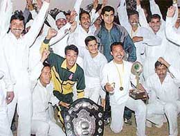 Jubilant athletes of the Liaison and Communication sector after they bagged the overall championship shield 