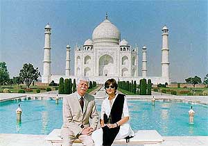 Mauritius Prime Minister Paul Raymond Berenger and his wife Arline pose for photographers in front of Taj Mahal during their visit to Agra 