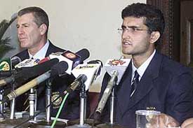 Indian skipper Saurav Ganguly addresses a Press conference along with the coach John Wright before leaving for Australia
