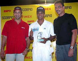 N.C. Aiyappa of Bangalore, who received the fastest bowler award from the great all rounder of Pakistan Wasim Akram
