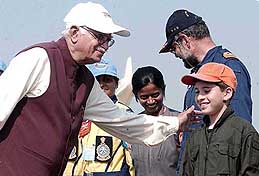 Deputy Prime Minister L.K. Advani congratulates youngest co-pilot of the Air Race India-2003 Mashaan Kaula 