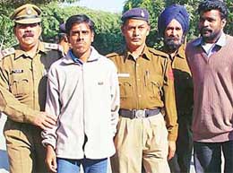 The accused, Sanjeev Kumar and Satpal, coming out of a local court