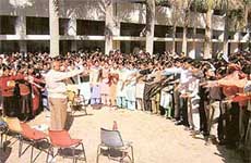 Students and staff of Government College, Naraingarh, take an oath before the Principal