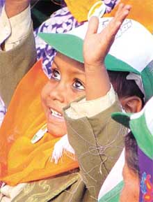 A tiny supporter at a rally