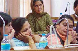 Women councillors Anu Chatrath, Geeta Chaudhary, Harjinder Kaur and Lalit Joshi are all ears to the Mayor, Mr Subhash Chawla