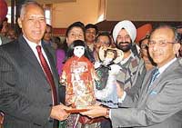 Punjab Governor and UT Administrator Justice O.P. Verma (retd) examines some of the specimen 