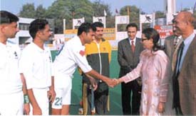 Mrs Neelam Pratap Rudy is being introduced to the Pakistan hockey team