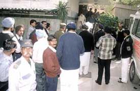 Relatives and friends outside Aashlok Hospital with the body of Dalip Sultani, who was shot dead near his Safdarjung Enclave residence