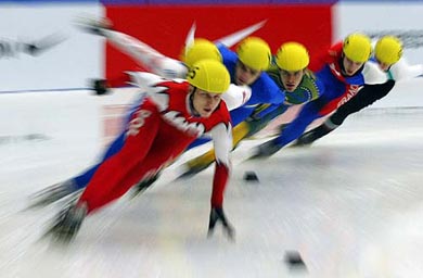 Skaters compete during the men's 1,500-metre heats of the 2003/2004 ISU World Cup in Jeonju, about 240- km south of Seoul on Friday