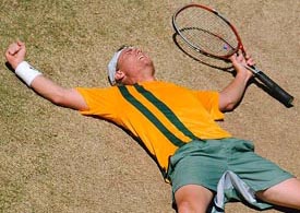 Australia's Lleyton Hewitt celebrates his victory over Spain's Juan Carlos Ferrero in the first rubber of the Davis Cup final in Melbourne