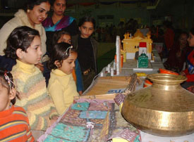 Students and their parents have a look at an exhibition organised at the BCM Arya Model Senior Secondary School
