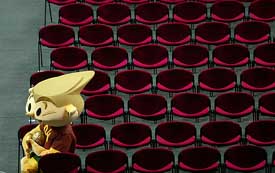 Quinas, the mascot of Euro 2004 soccer championship, takes rest on the seats of the Atlantic pavillion in Lisbon