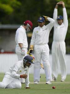 India's Akash Chopra drops Craig Philipson during their match against Queensland in Brisbane 