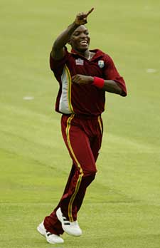 West Indies bowler Fidel Edwards celebrates after dismissing Zimbabwe's Stuart Matsikenyeri