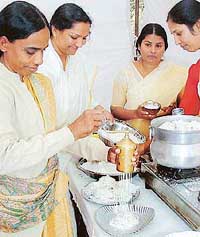 Women prepare Kerala noodles at South Indian Food Festival organised by the Orthodox Syrian Church Society