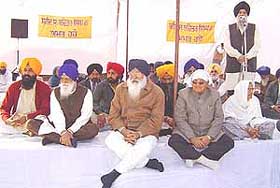 Mr Parkash Singh Badal, SAD President, along with Capt Kanwaljit Singh (standing), Mr Gurcharan Singh Tohra, Mr Madan Mohan Mittal and Mr Prem Singh Chandumajra at a function organised at Padiala village in Ropar on Sunday.