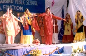 Girls perform gidha at the annual function of Shri Guru Hargobind Public School