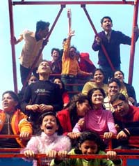 Students of Sacred Heart School,BRS Nagar,take a joy ride during a fete organised on the school premises