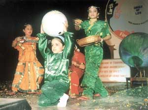Students of Children's Valley School performing a ballet, Circle of Life, at FICCI Auditorium.