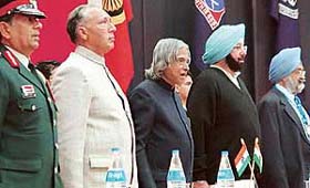 President A.P.J. Abdul Kalam (centre) sings the National Anthem during the inaugural ceremony of the Army Institute of Law in Mohali