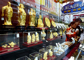 Spot gold held just above $400 an ounce in Asia on Tuesday